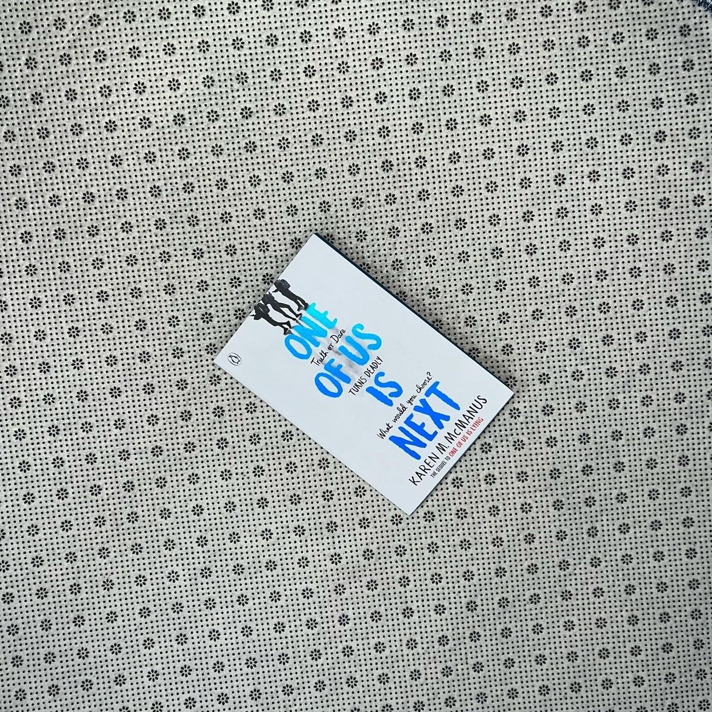 one of us is next one of us is lying book 2 coloured edgesby karen m mcmanus