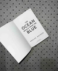 THE OCEAN WOULD PAINT ME BLUE by Zoulfa Katouh