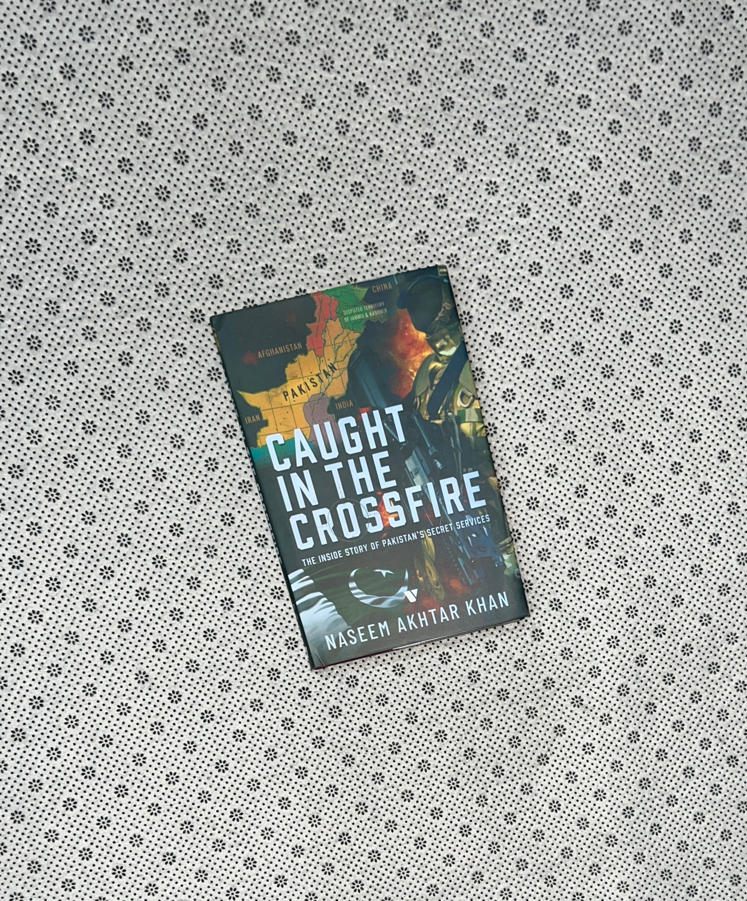 CAUGHT IN THE CROSSFIRE: THE INSIDE STORY OF PAKISTAN'S SECRET SERVICES by Naseem Akhtar Khan