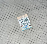 THE ADVENTURES OF TOM SAWYER by Mark Twain