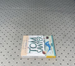 THE ADVENTURES OF TOM SAWYER by Mark Twain