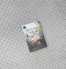 the songbird and the heart of stone crowns of nyaxia series book 3 by carissa broadbent