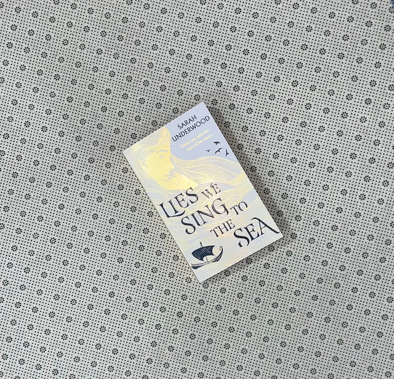 lies we sing to the sea by sarah underwood