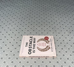 THE OBSTACLE IS THE WAY: The Timeless Art Of Turning Trials Into Triumph (Expanded 10th anniversary Edition) by Ryan Holiday