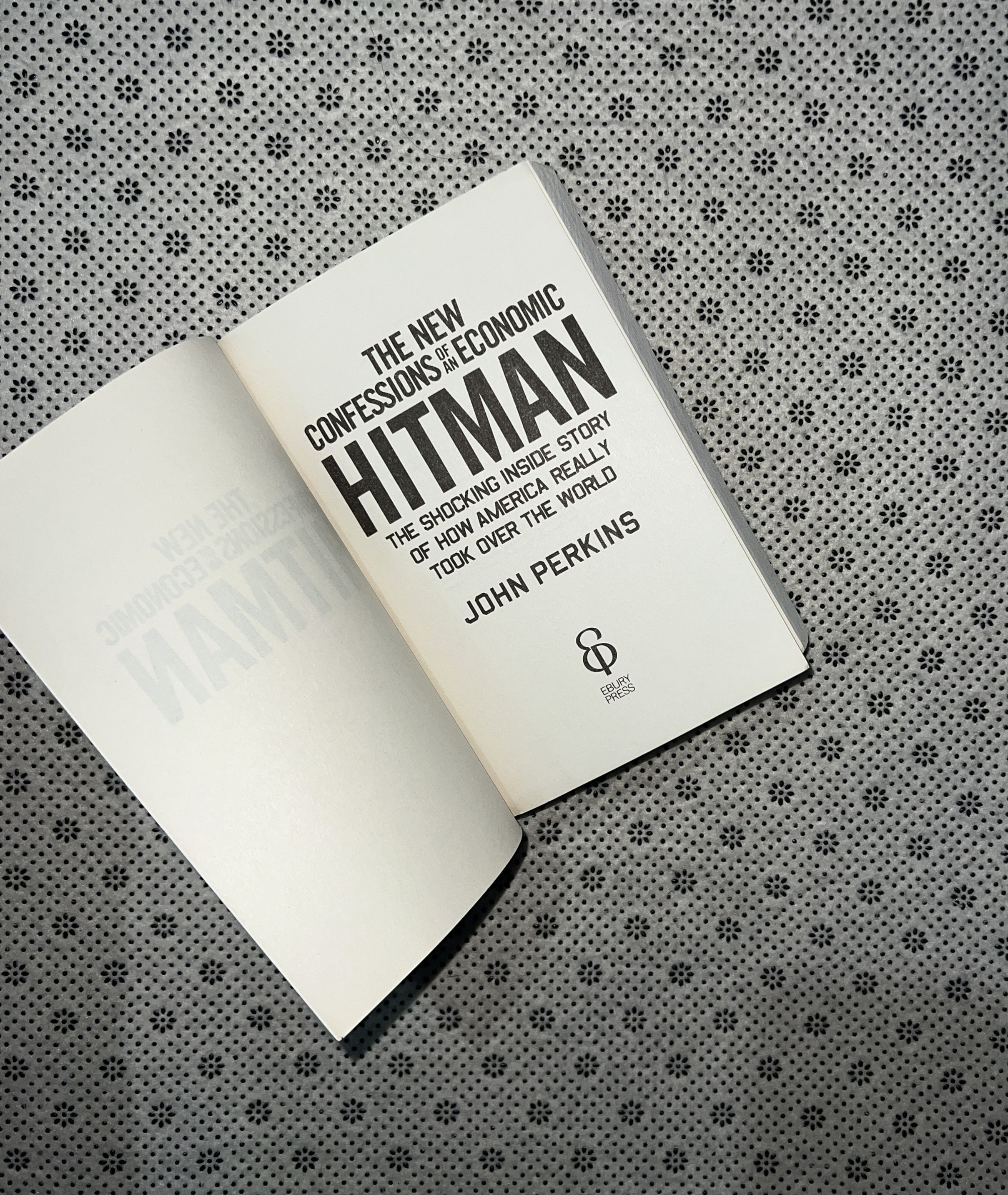 THE NEW CONFESSIONS OF AN ECONOMIC HIT MAN: How America Really Took Over The World by John Perkins