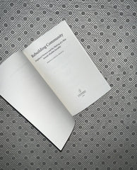 REBUILDING COMMUNITY by Shenila Khoja-moolji