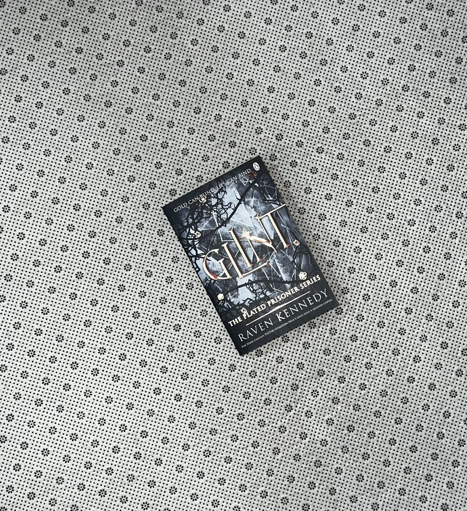 glint plated prisoner series book 2 by raven kennedy