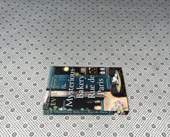 THE MYSTERIOUS BAKERY ON RUE DE PARIS by Evie Woods