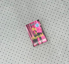 by a thread by lucy score