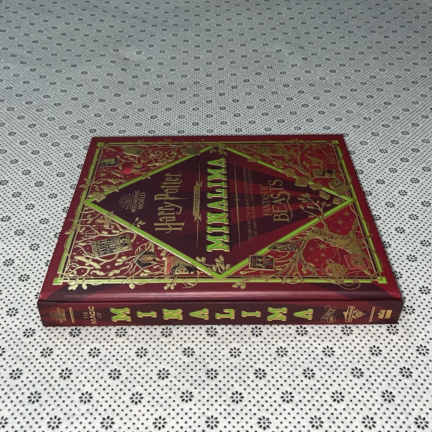 the magic of minalima celebrating the graphic design studio behind the harry potter fantastic beasts films by miraphora mina