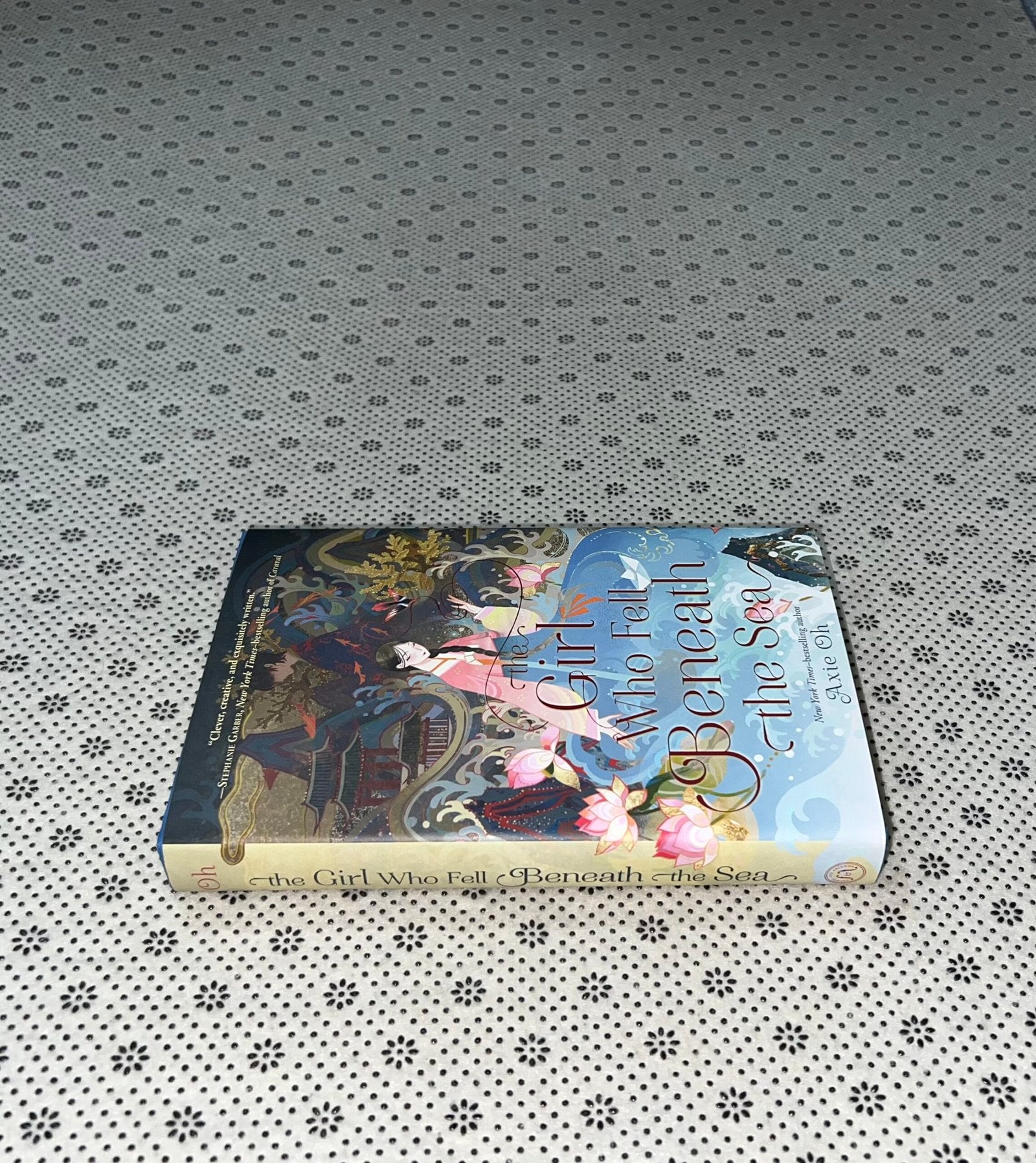 the girl who fell beneath the sea dust jacket edition by axie oh