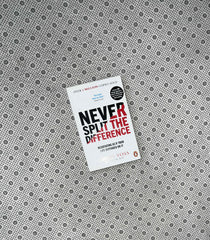 NEVER SPLIT THE DIFFERENCE: Negotiating as If Your Life Depended On It by Chris Voss