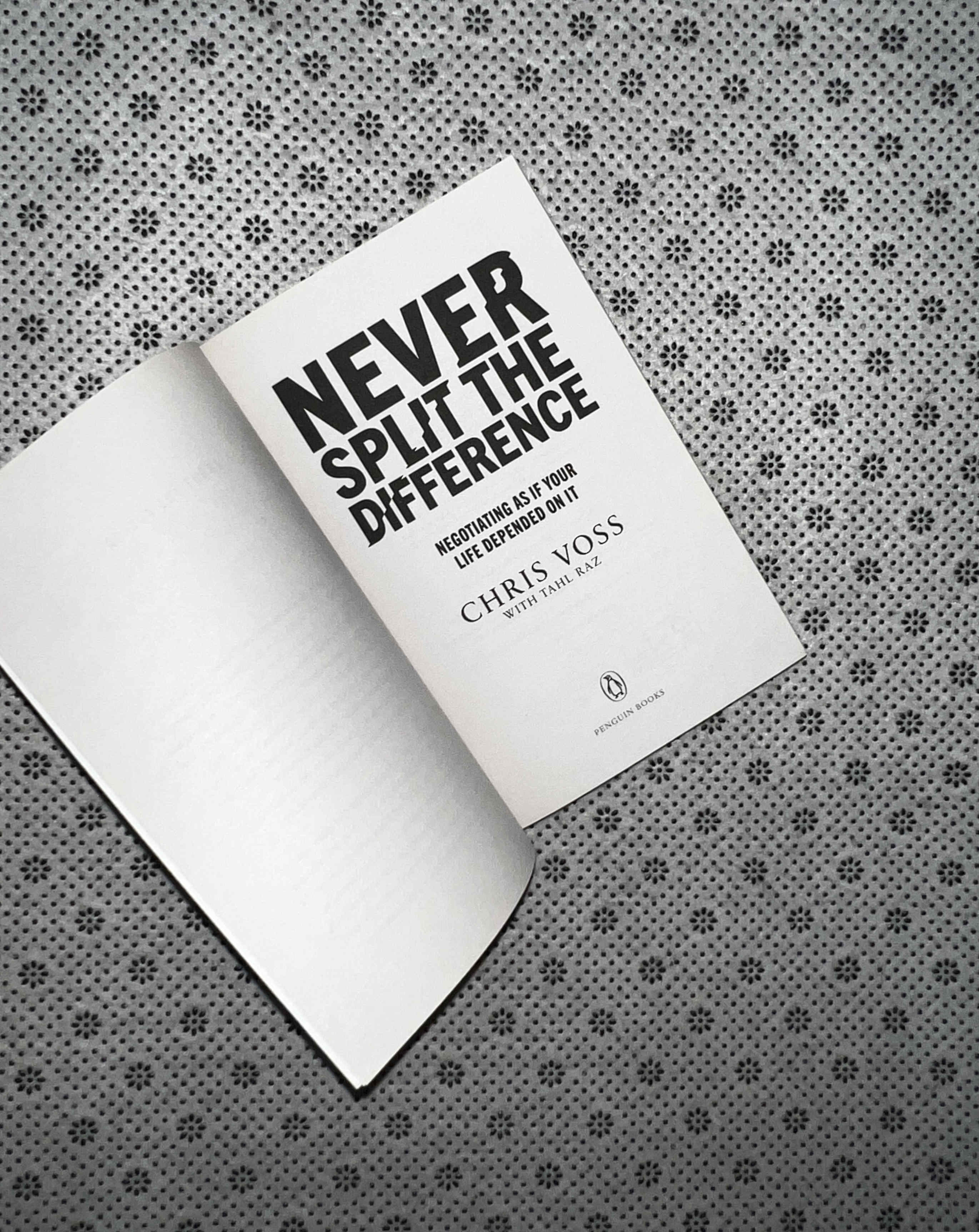 NEVER SPLIT THE DIFFERENCE: Negotiating as If Your Life Depended On It by Chris Voss
