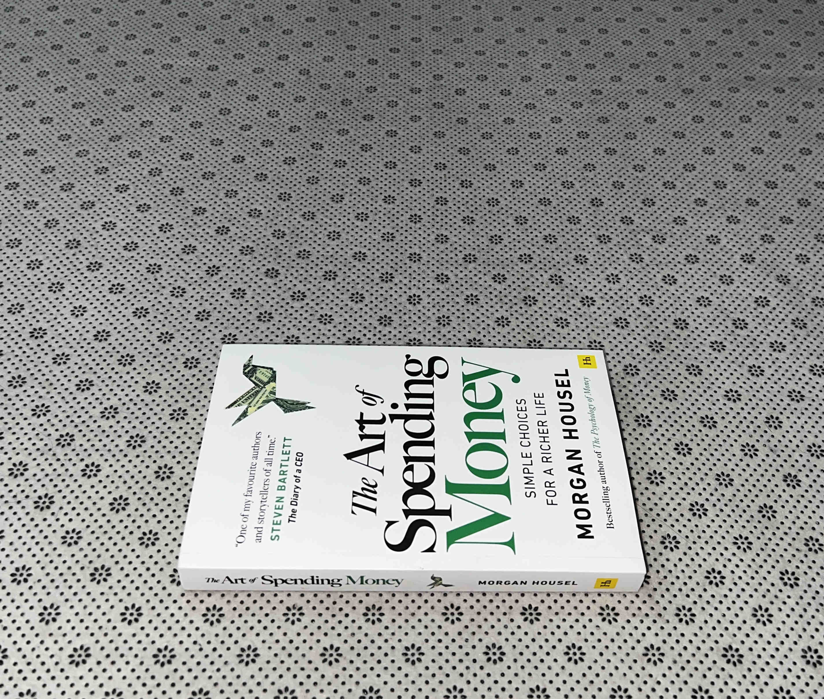 THE ART OF SPENDING MONEY: Simple Choices For a Richer Life by Morgan Housel