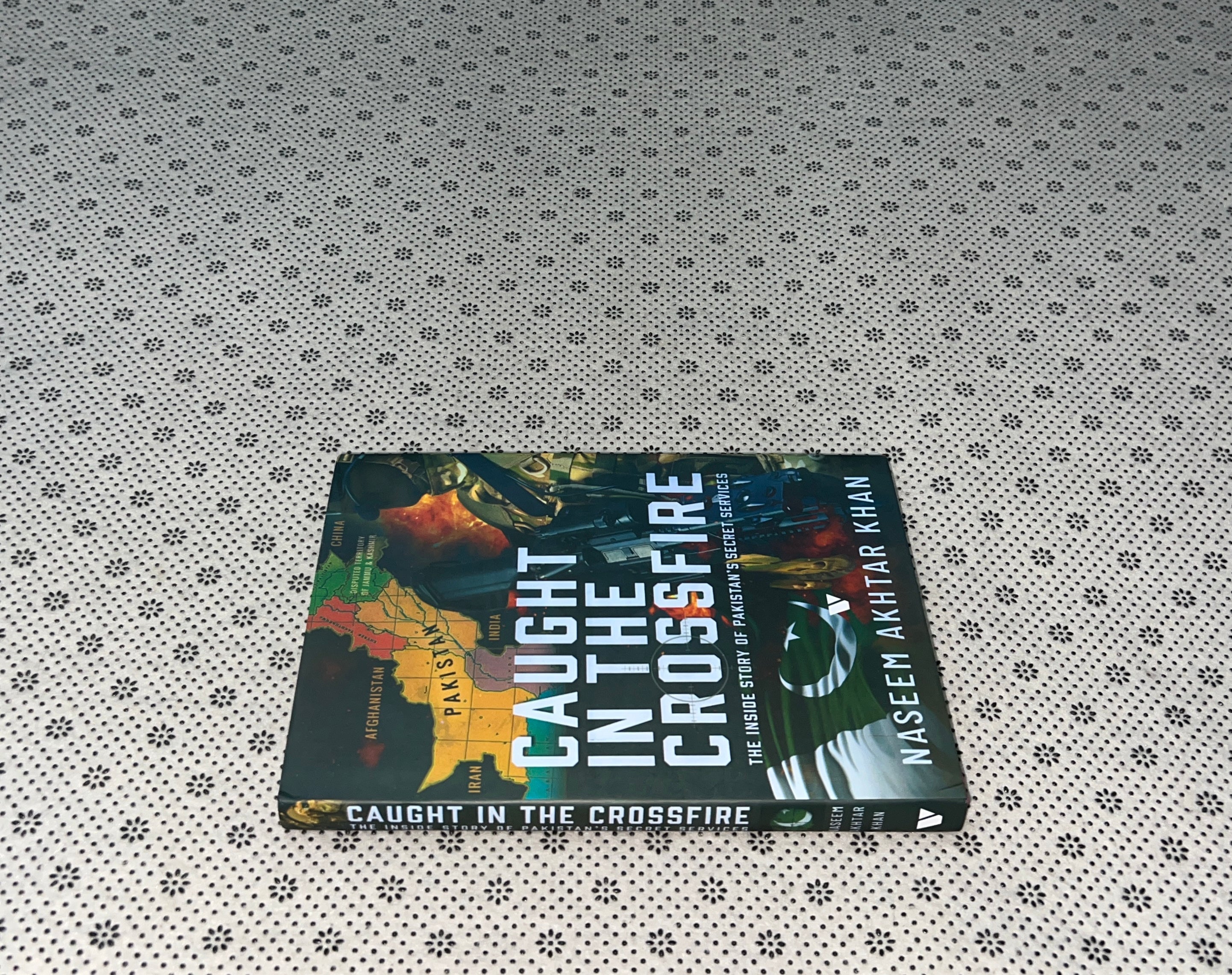 CAUGHT IN THE CROSSFIRE: THE INSIDE STORY OF PAKISTAN'S SECRET SERVICES by Naseem Akhtar Khan