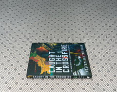 CAUGHT IN THE CROSSFIRE: THE INSIDE STORY OF PAKISTAN'S SECRET SERVICES by Naseem Akhtar Khan