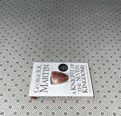 A KNIGHT OF THE SEVEN KINGDOMS by George R.R. Martin