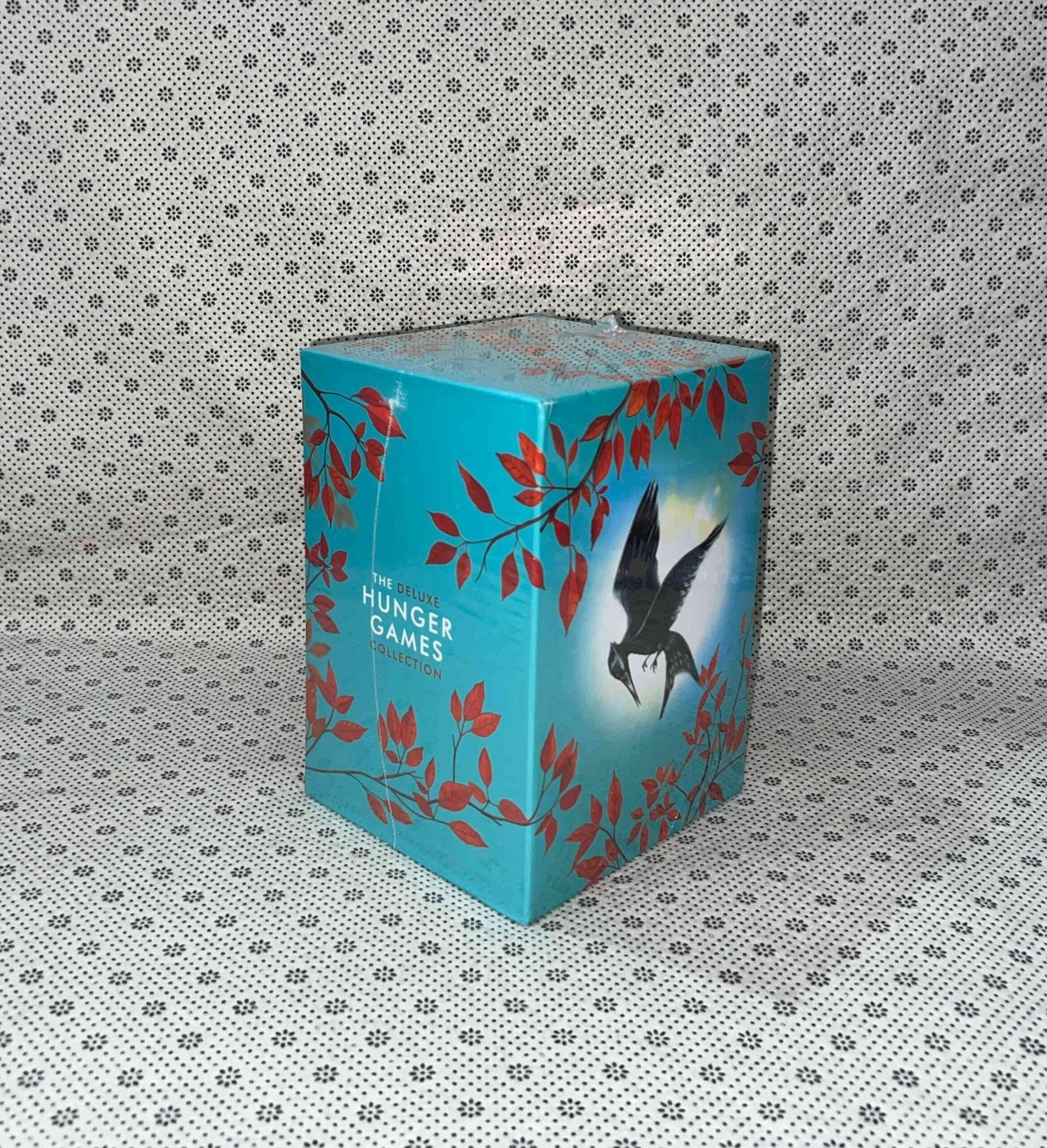the deluxe hunger games collection by suzanne collins