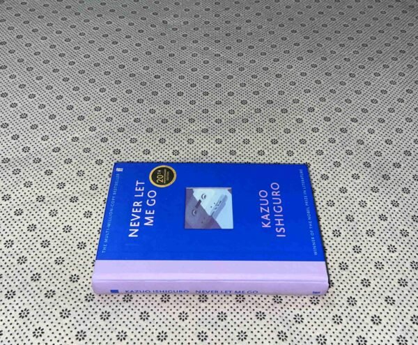 NEVER LET ME GO: Twentieth Anniversary Edition by Kazuo Ishiguro